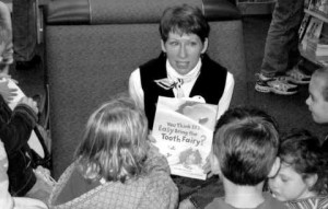 Sheri Bell-Rehwoldt Reading to a Group of Children